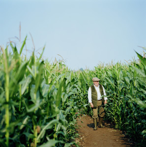 image of farmer and corn on origins of corn blog.